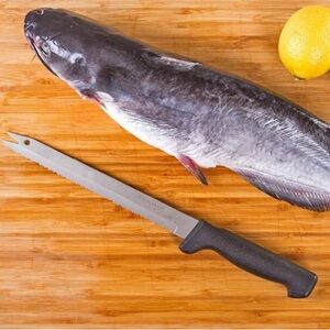 Vintage Quikut 8 Inch Carving Knife Serrated Surgical Stainless Steel Black Hand